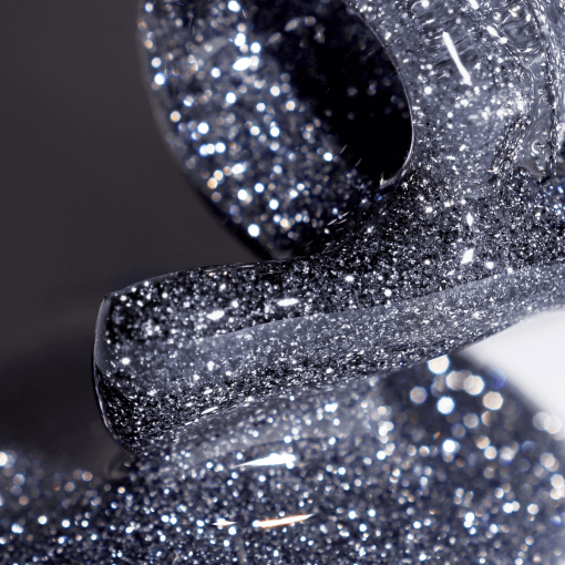 Nahaufnahme des Shock Effect 02 Crystal Grey – UV/LED Gellack mit reflektierendem Glitzer
